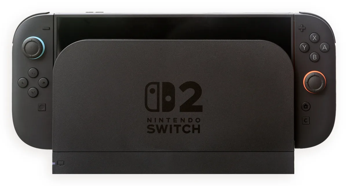 A Nintendo Switch 2 console seated in its dock with Joy-Con attached on both sides